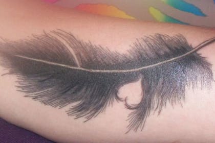 Heart feather tattoo