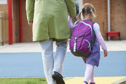 Parent and child with rucksack