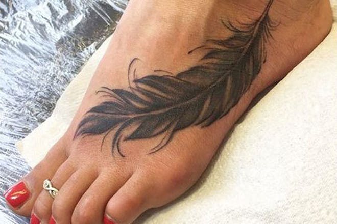 Foot feather tattoo