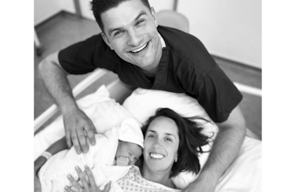 Janette Manrara and husband cuddle newborn baby in hospital
