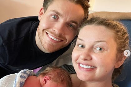 Amy Hart and Sam Rason with their baby 