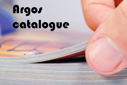 finger paging through catalogue