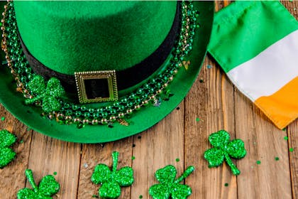 Green St Patrick's Day top hat decorate with sequins, beads and buckle with an Irish flag