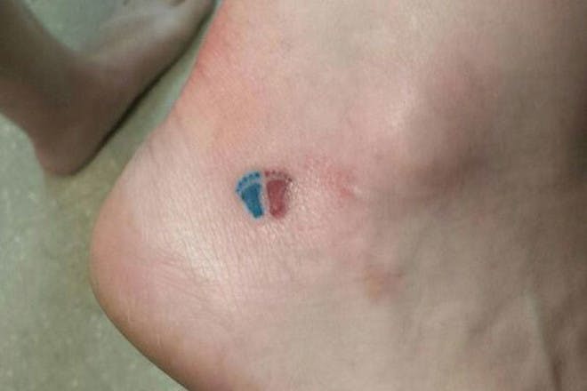 Footprints ankle miscarriage tattoo