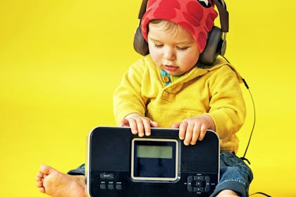 toddler with headphones