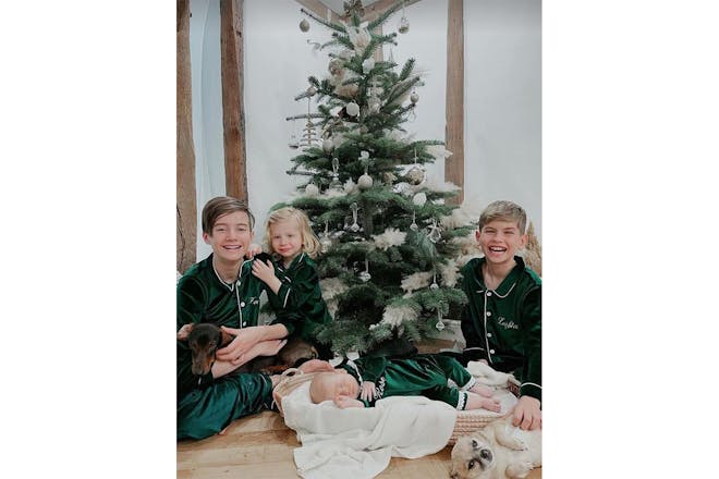 Stacey Solomon's children by their Christmas tree