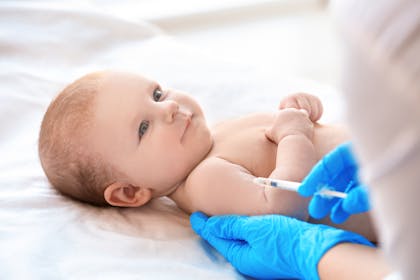 young baby having an injection