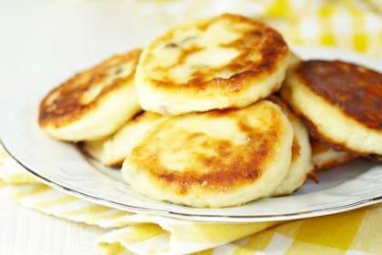 Mini cheesy pancakes on a plate