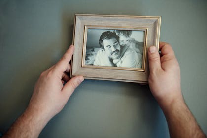 Picture of father and child in photo frame