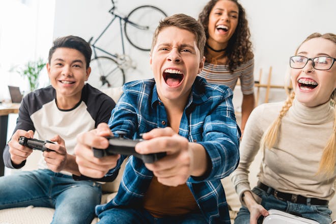 Group of teenagers playing video games