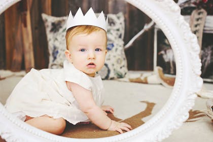 baby wearing crown