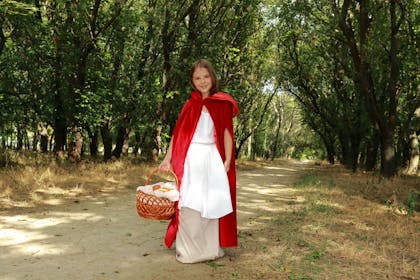Girl dressed as Little Red Riding Hood