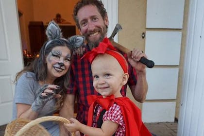 Family dressed as Little Red Riding Hood and wolf