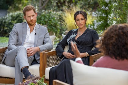 Harry and Meghan being interviewed by Oprah
