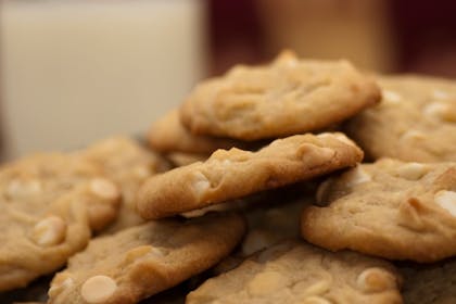 Pile of cookies with white choc chips