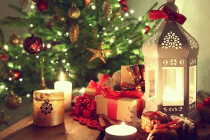 christmas hygge - fairy lights, candles and cosy christmas scene