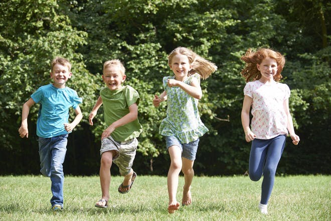 Children running and playing outdoors