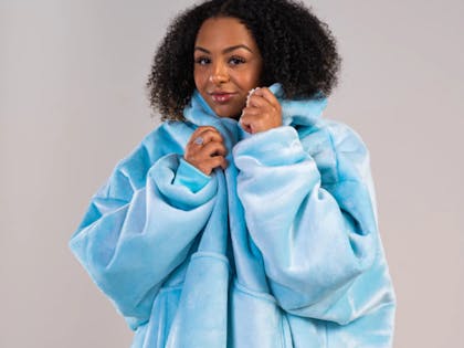 Woman wearing Ony hooded blanket