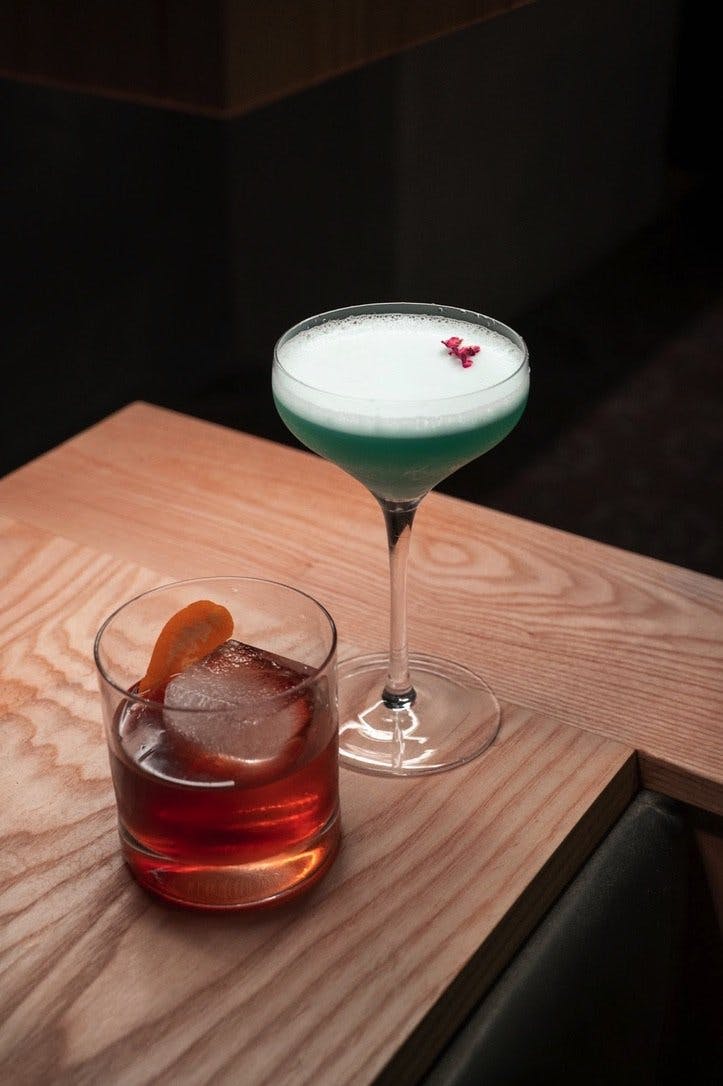 Two alcoholic drinks at Tres Leches