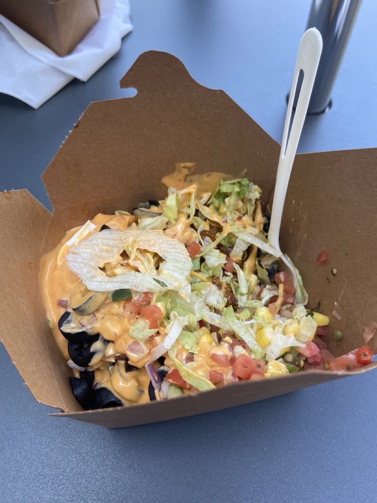 Orange chicken burrito bowl at Terrace