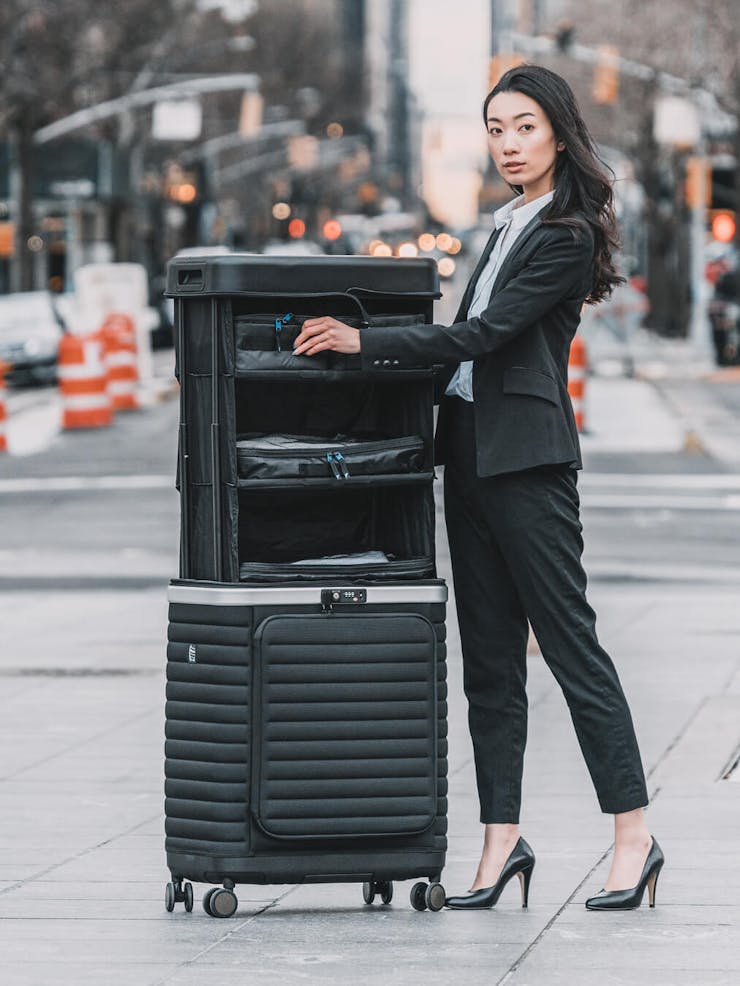 Pull Up Suitcase in black- opened case in New York