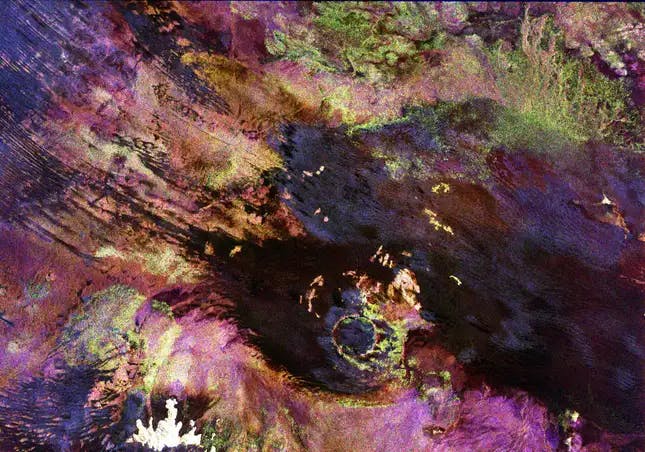 The undulations of the the Roter Kamm impact crater in southwest Namibia are pictured in 1994. The crater is believed to be about five million years old.