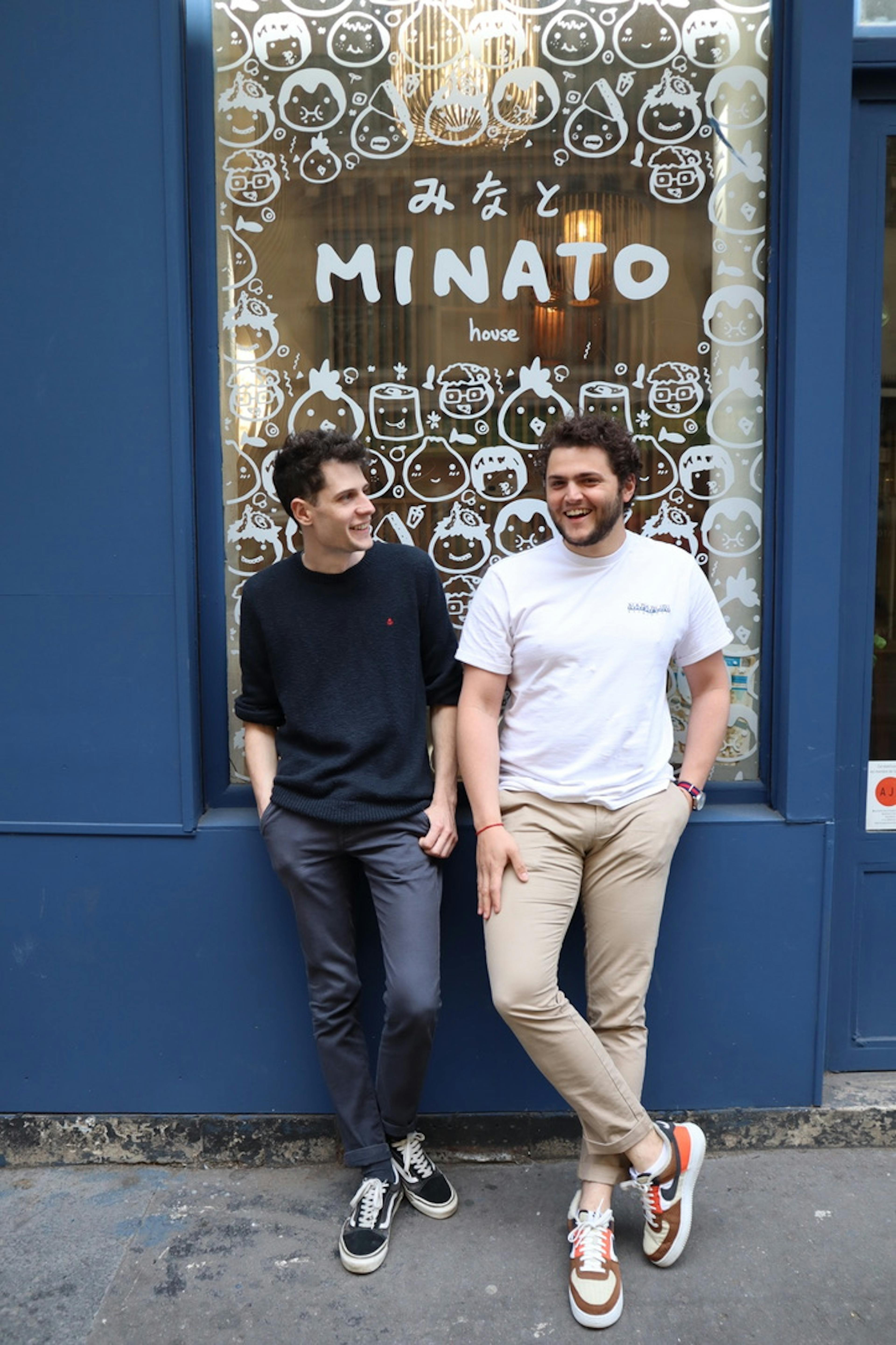 Image of EDOSTAR group restaurant owners outside MINATO storefront