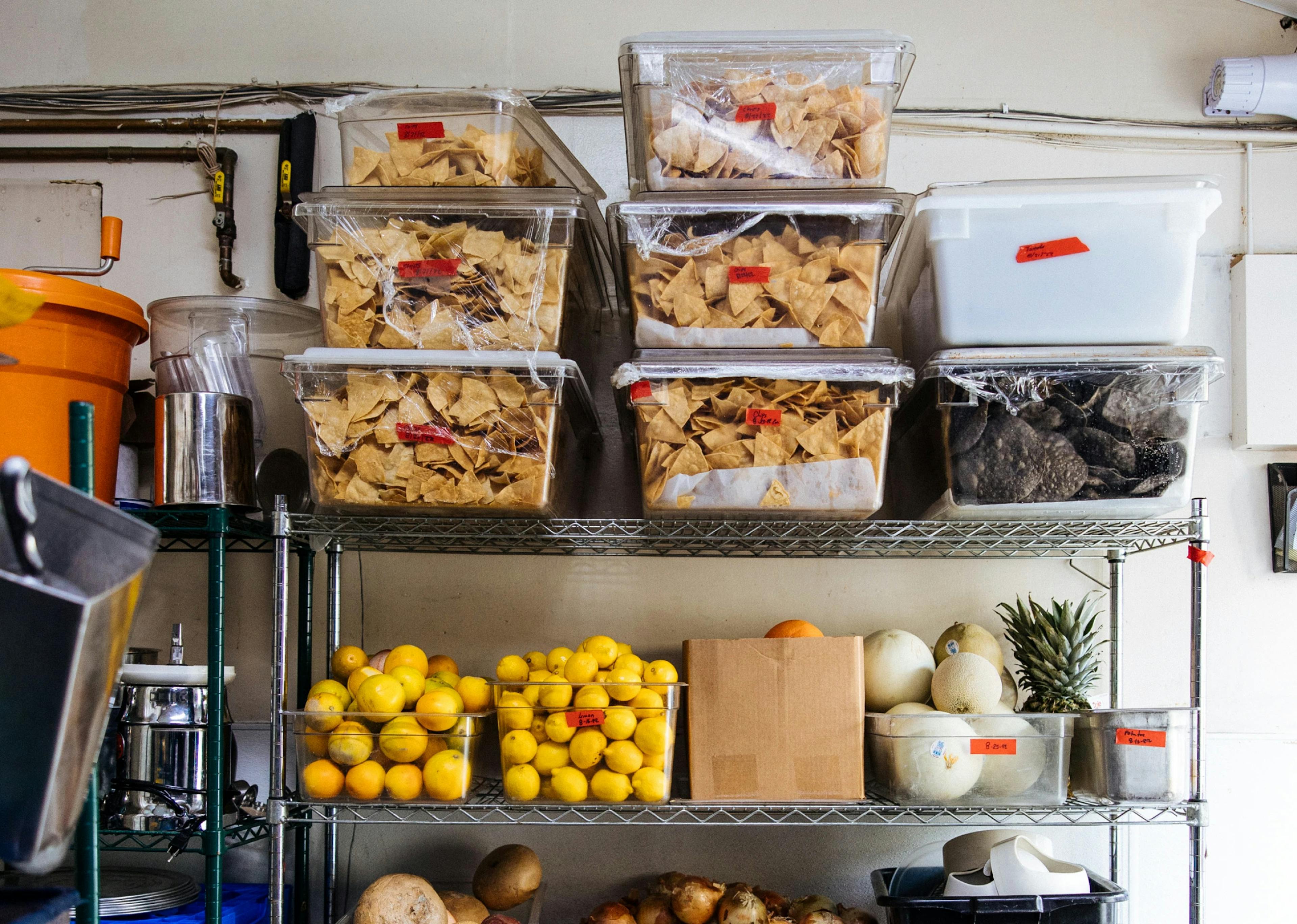 Image of a pantry rack filled with fresh produce and ingredients