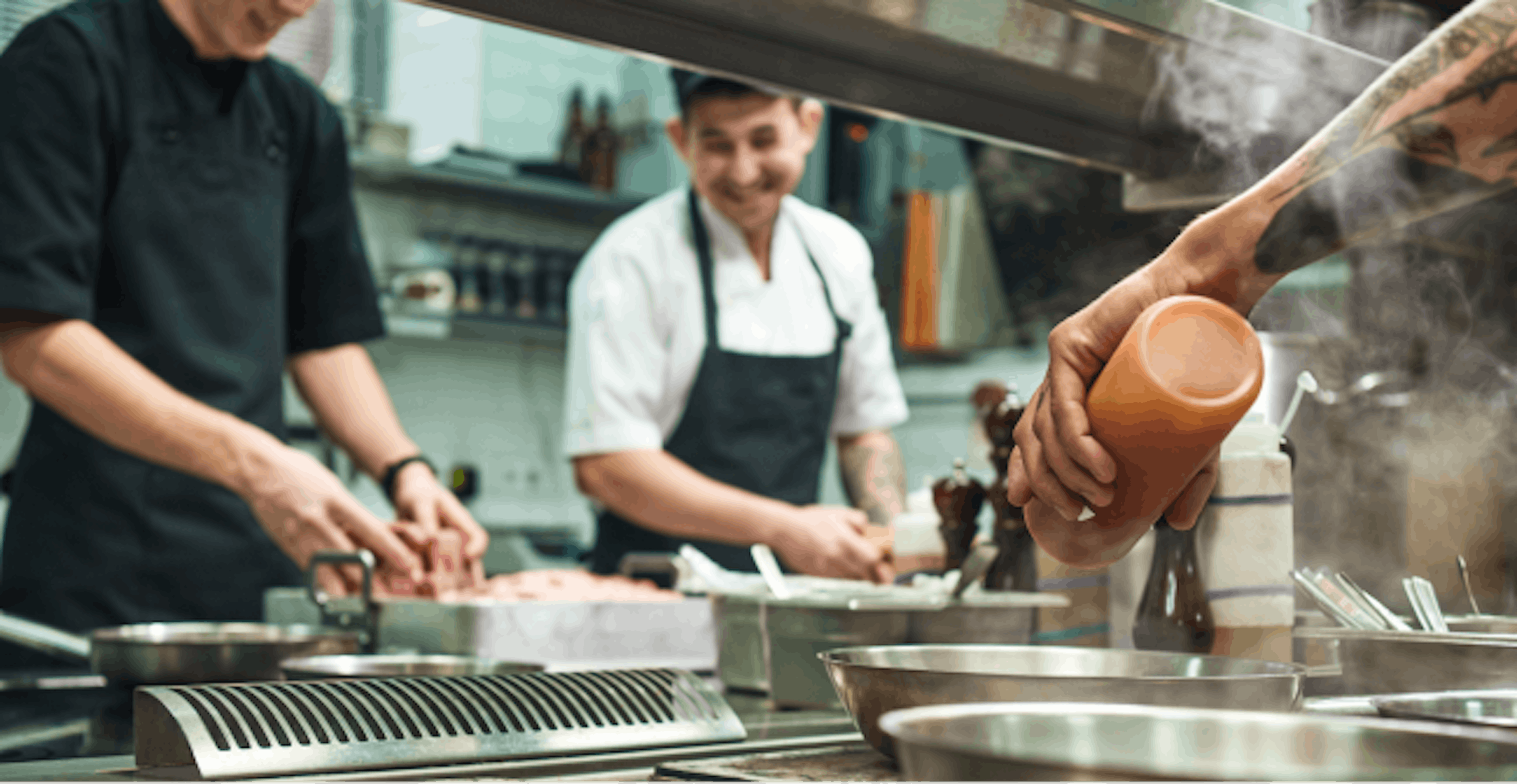 Image of restaurant staff working in the kitchen