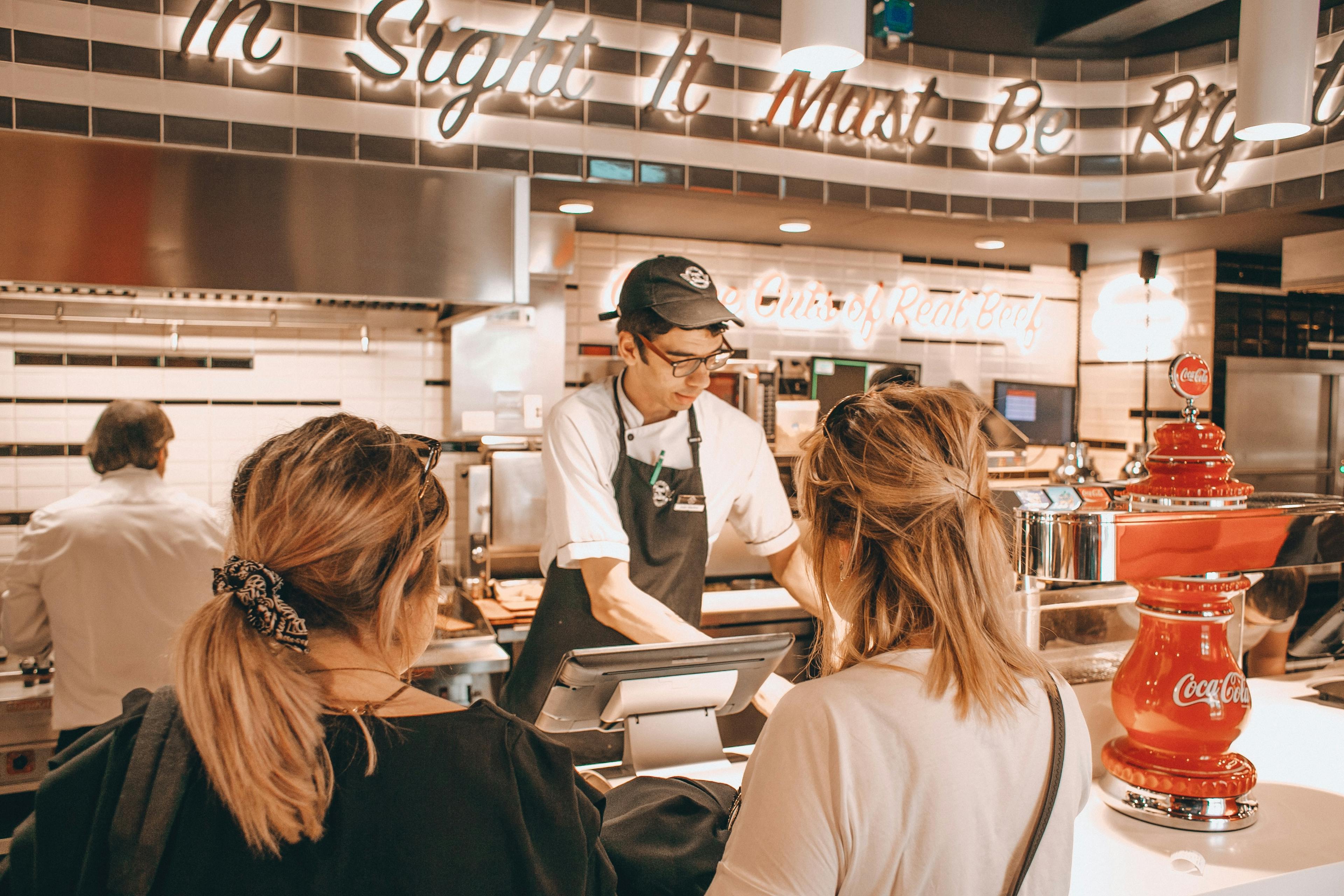 Image of a restaurant worker at a diner-style restaurant