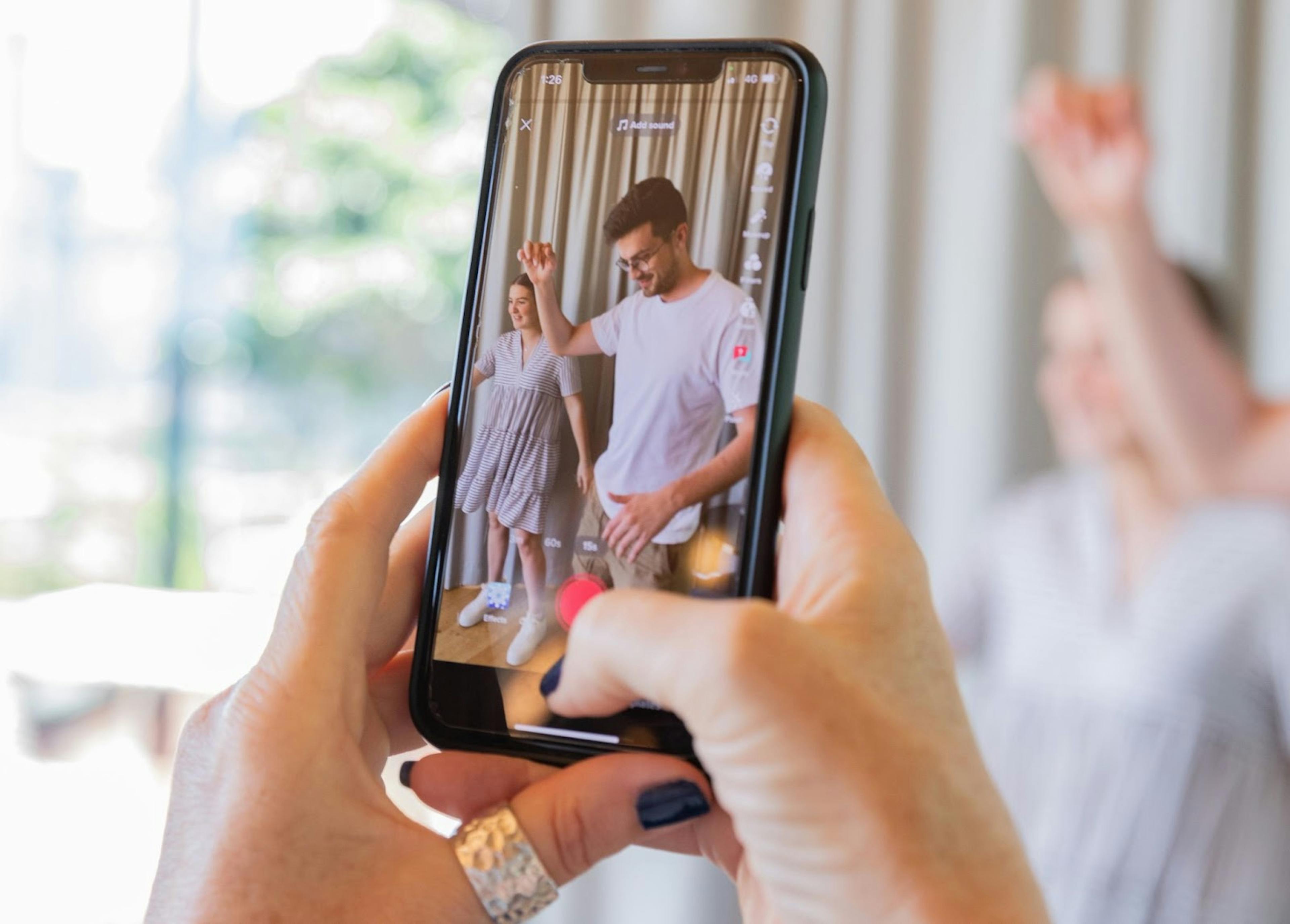 Image of a cooking reel being captured on phone camera