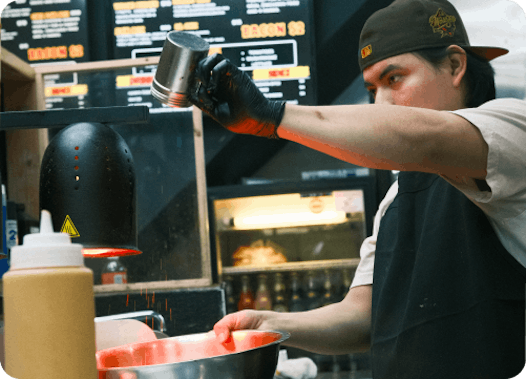 Cook making fries at IDK Philly