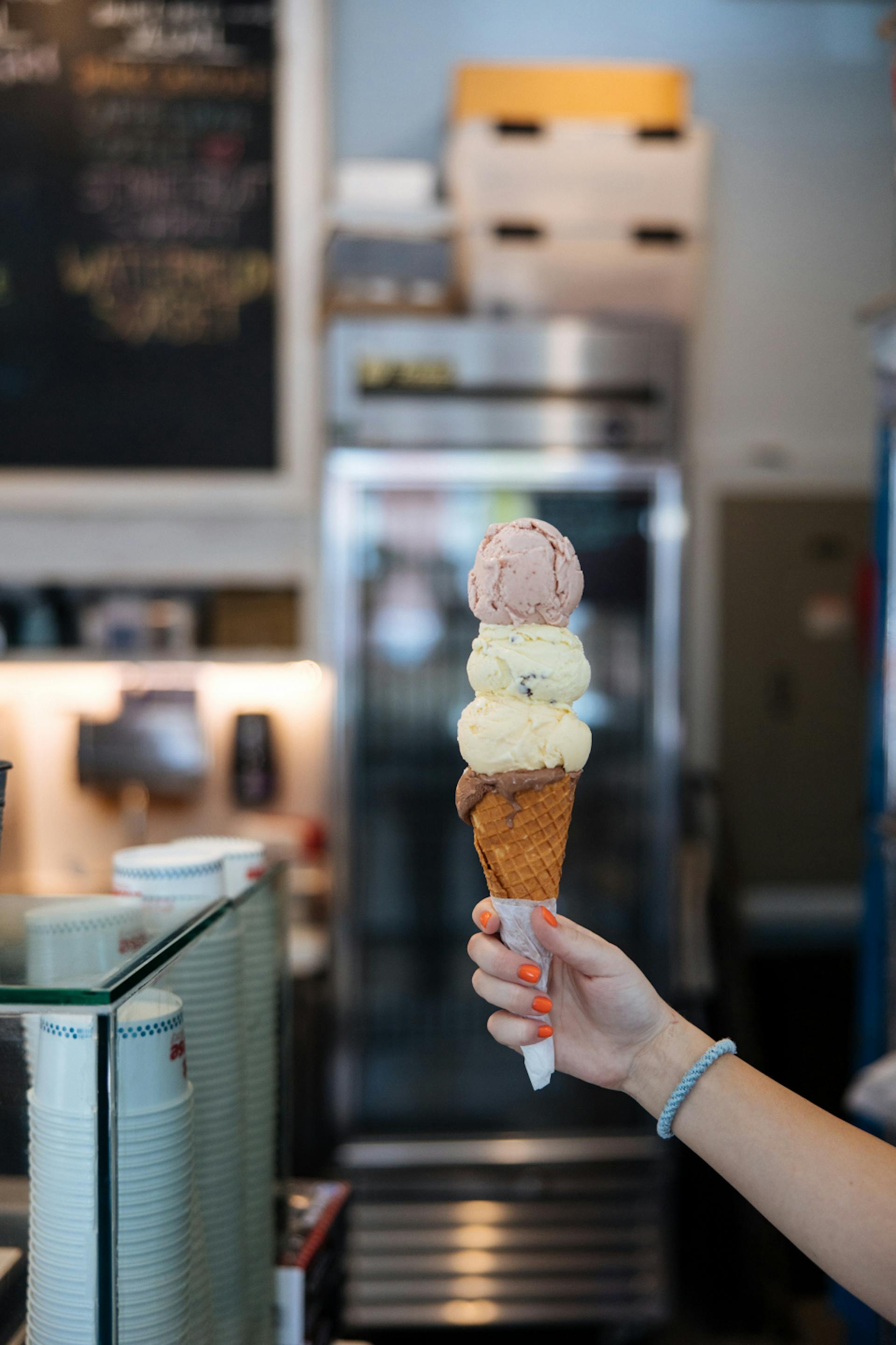 Woman holding ice cream cone