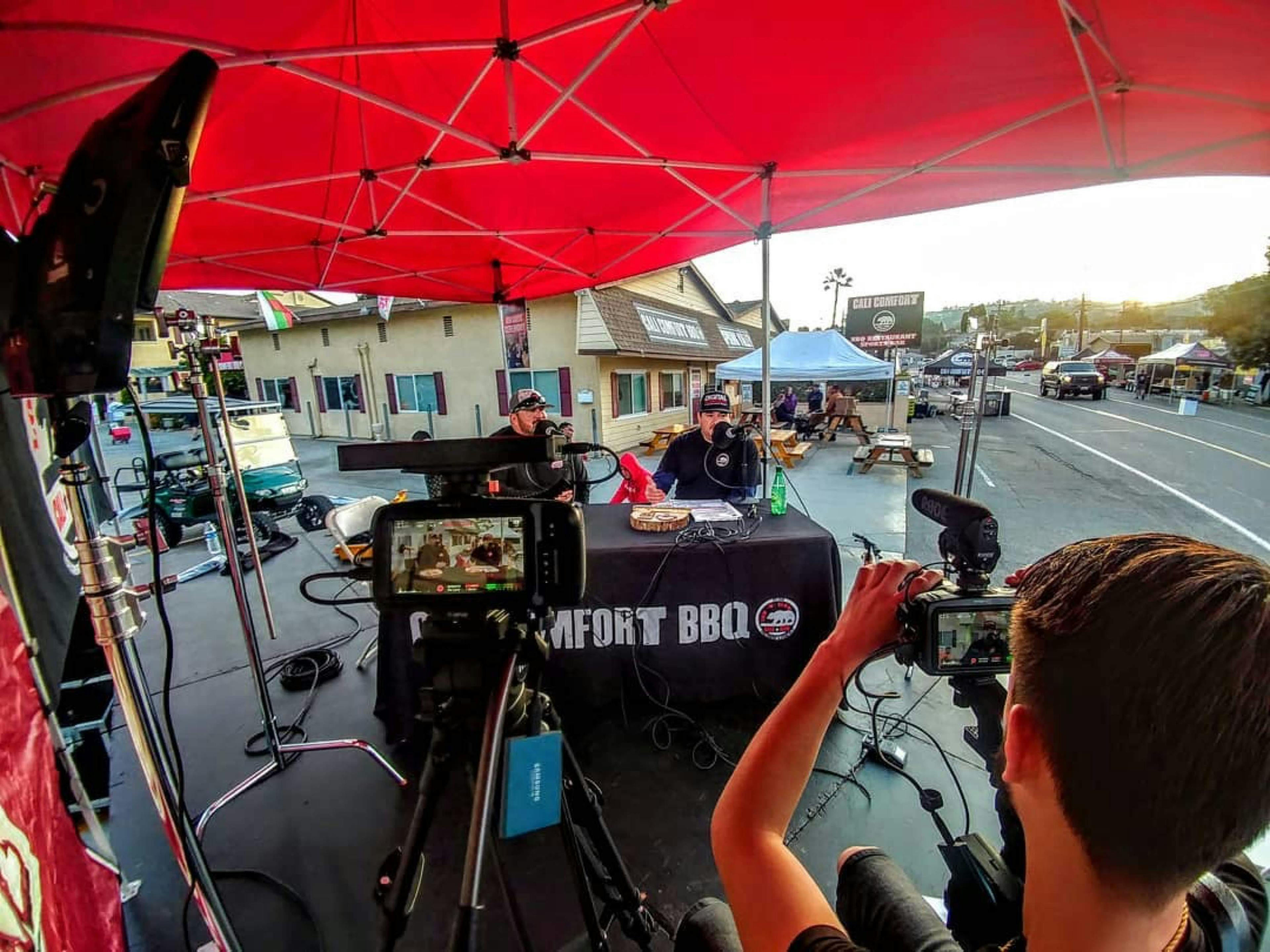 Image of Shawn Walchef and the Cali BBQ crew shooting a commercial on a busy street