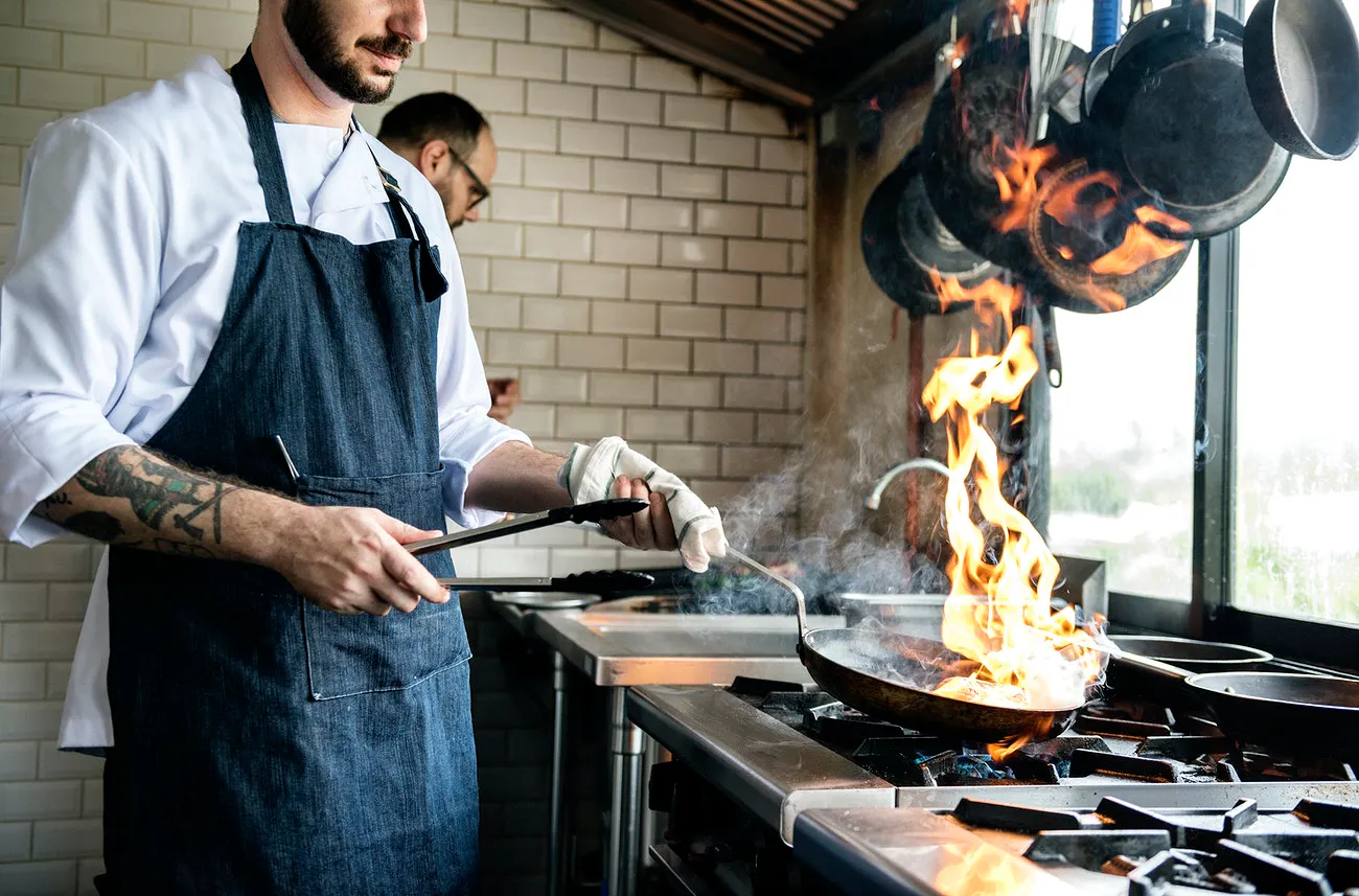 Image of restaurant chef cooking in a ghost kitchen space