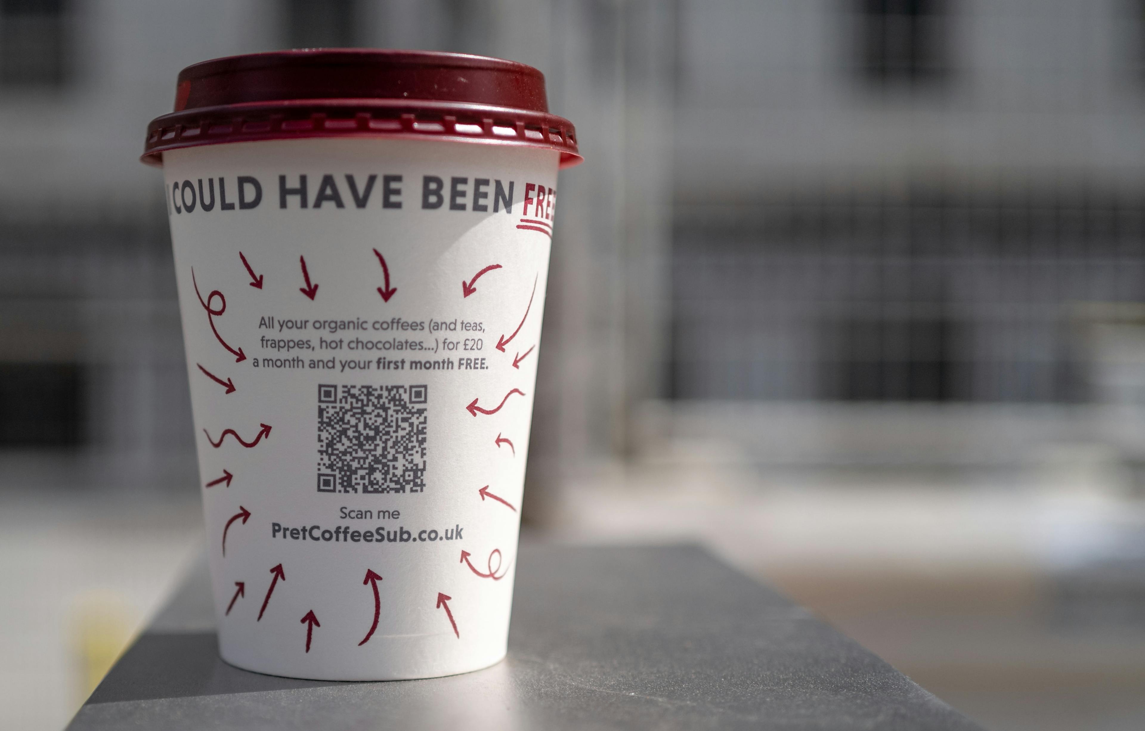 A coffee cup with a QR code on it.