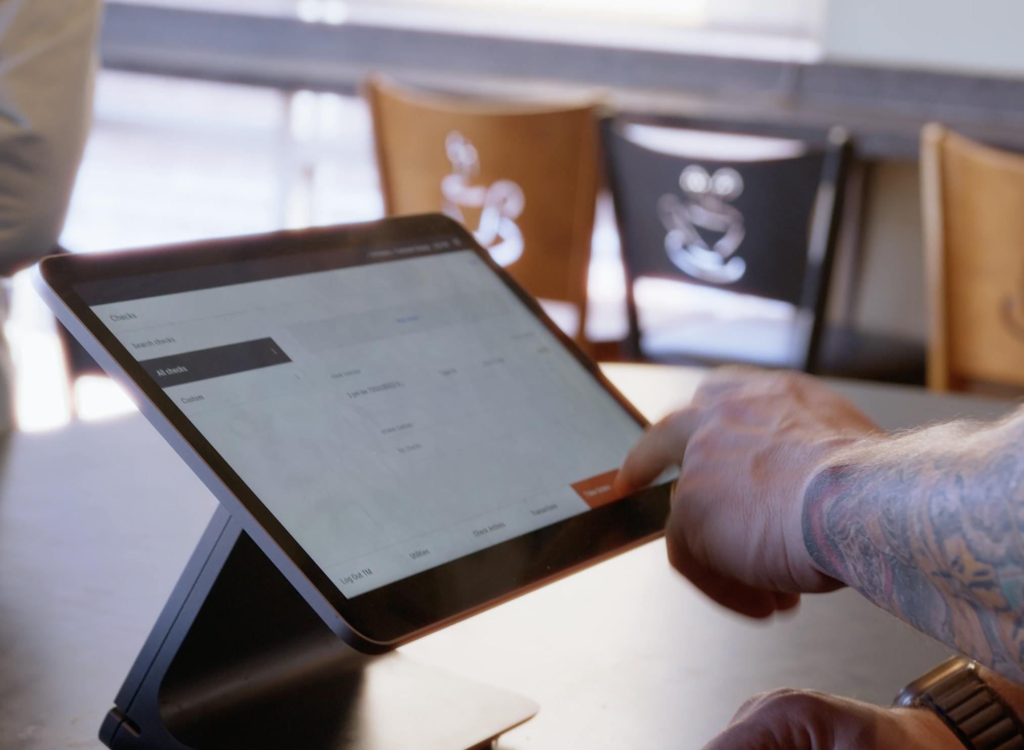 A restaurant owner using Otter POS.