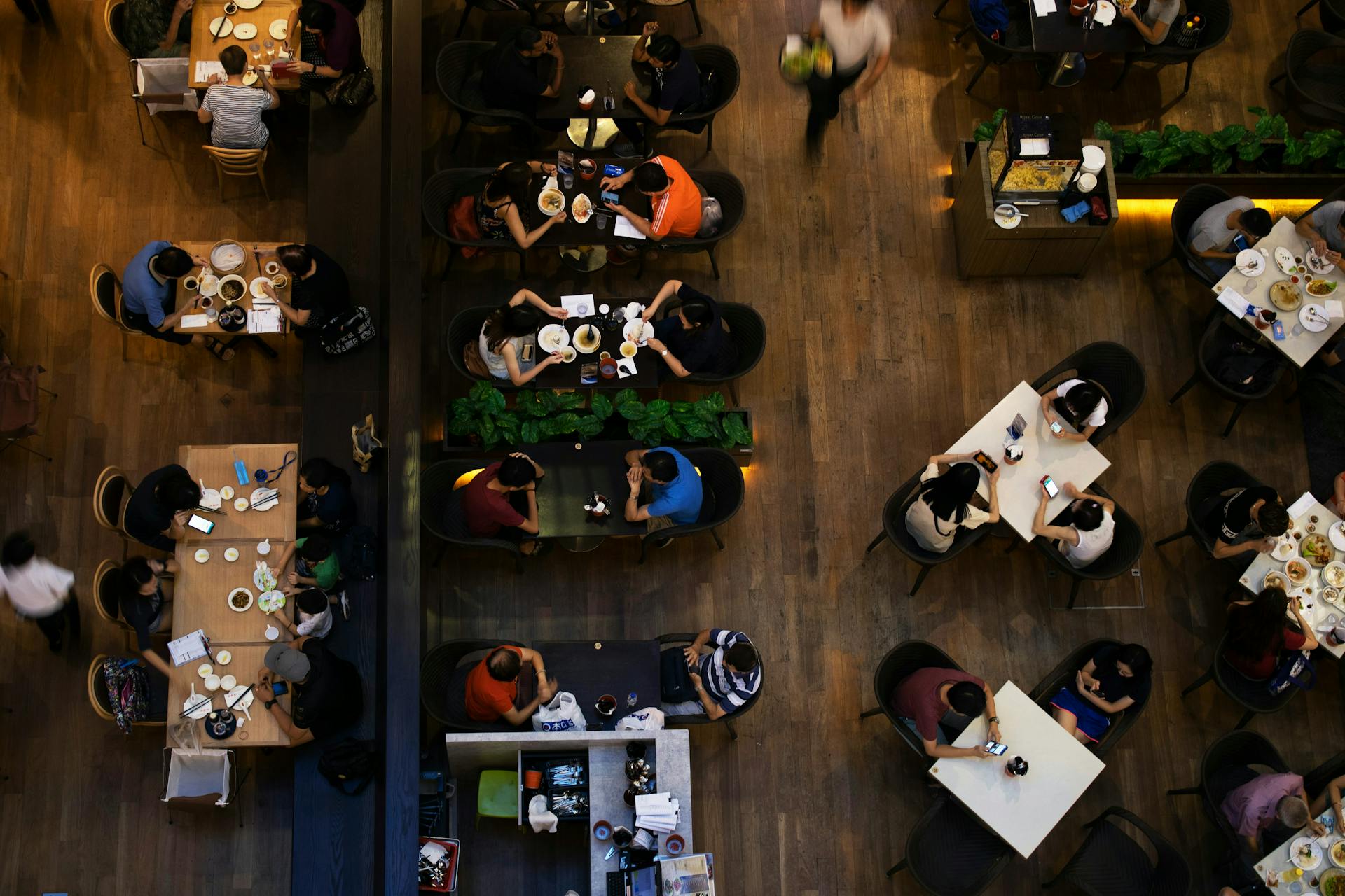 Several customers at a restaurant.