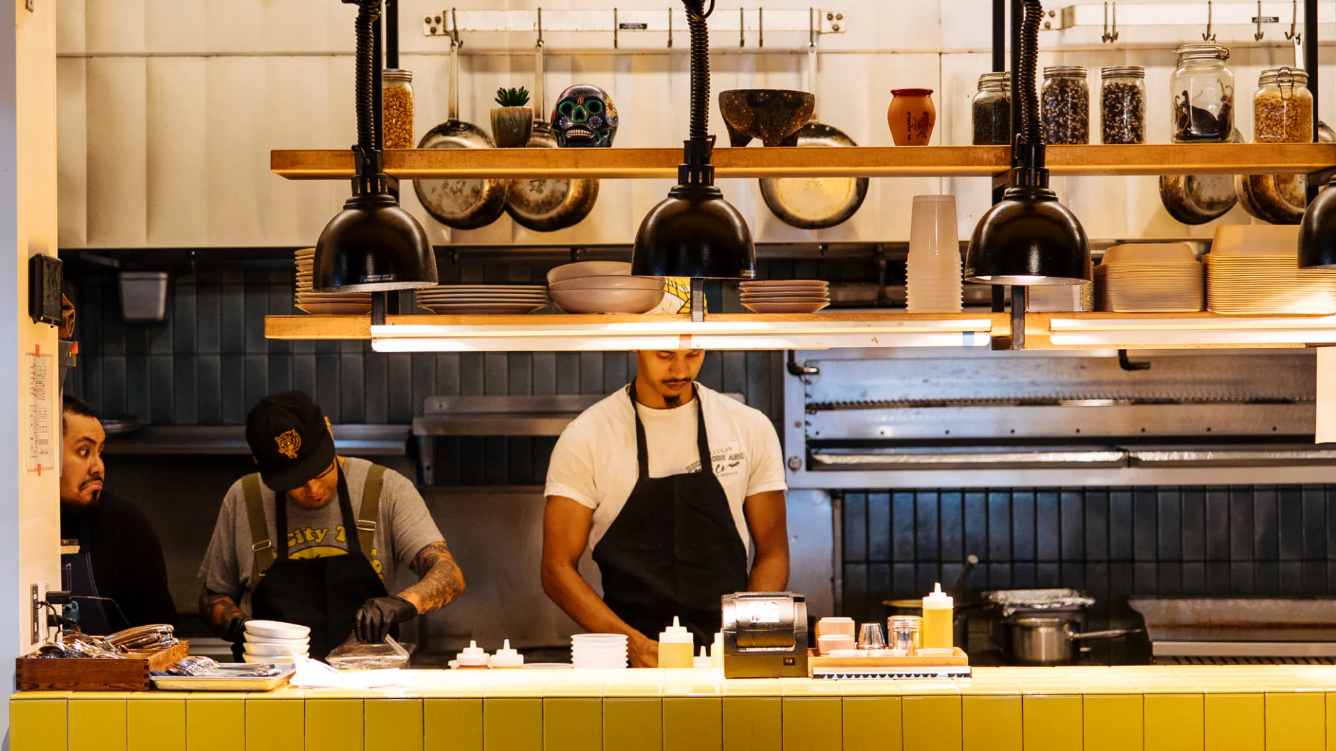 Kitchen staff working at a restaurant.