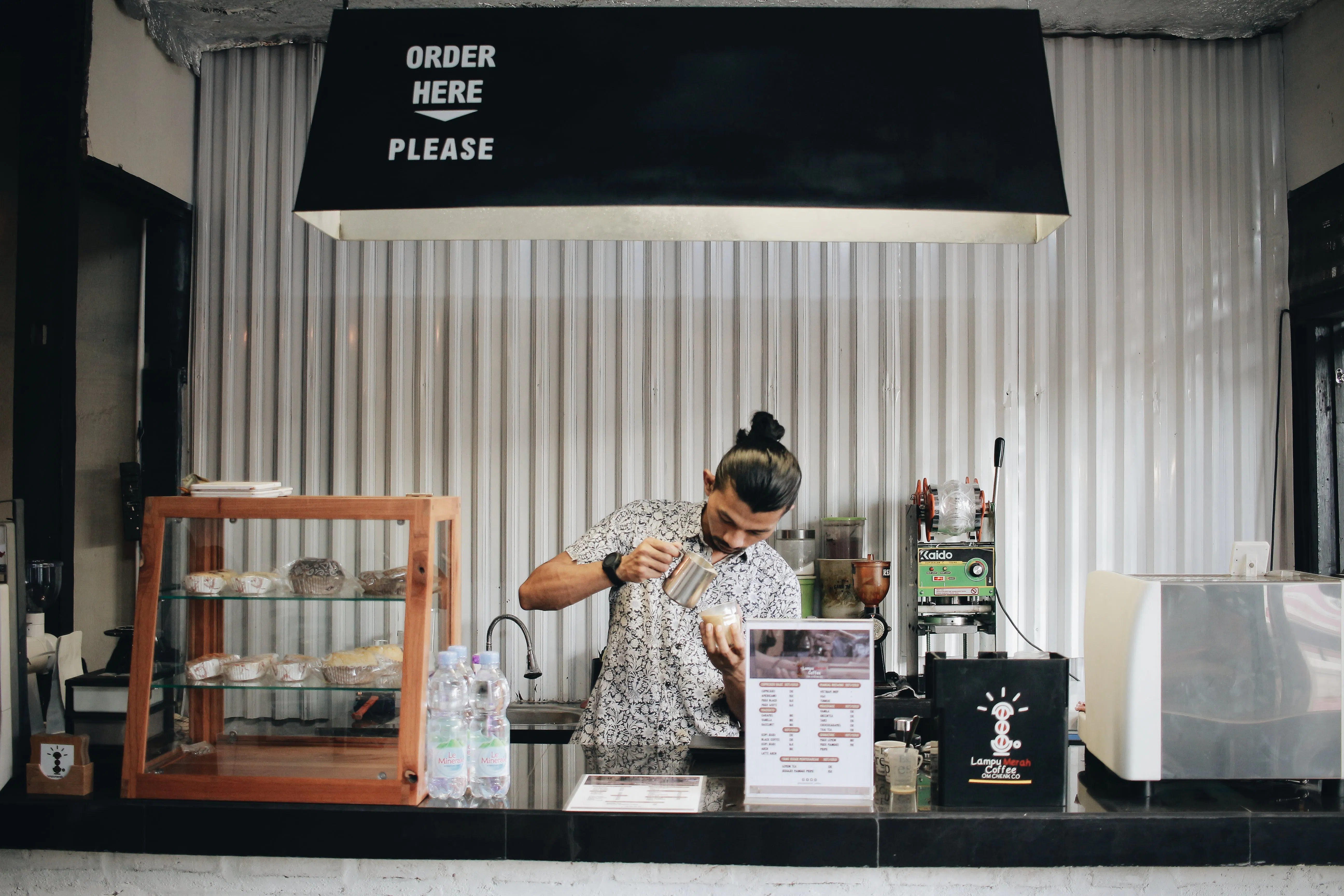 A barista in a cafe.