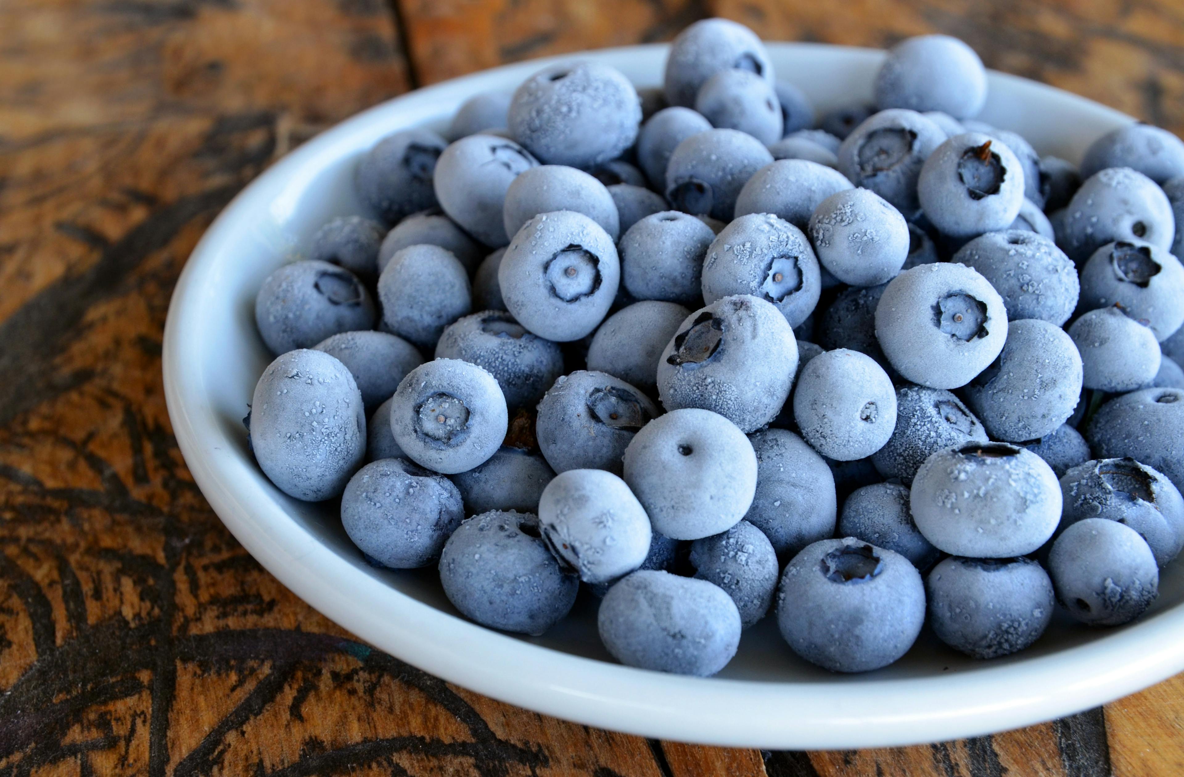 Frozen blueberries in a bowl. 