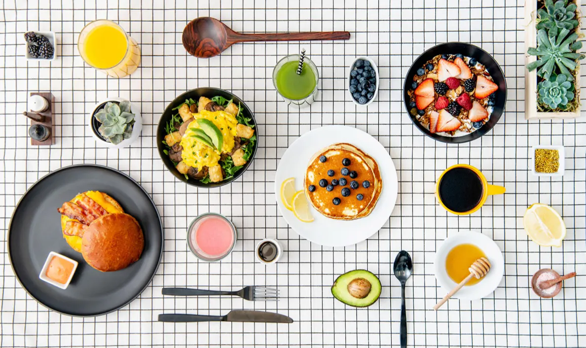 Image of a virtual breakfast restaurant with eggs, pancakes, oatmeal, a breakfast sandwich and more