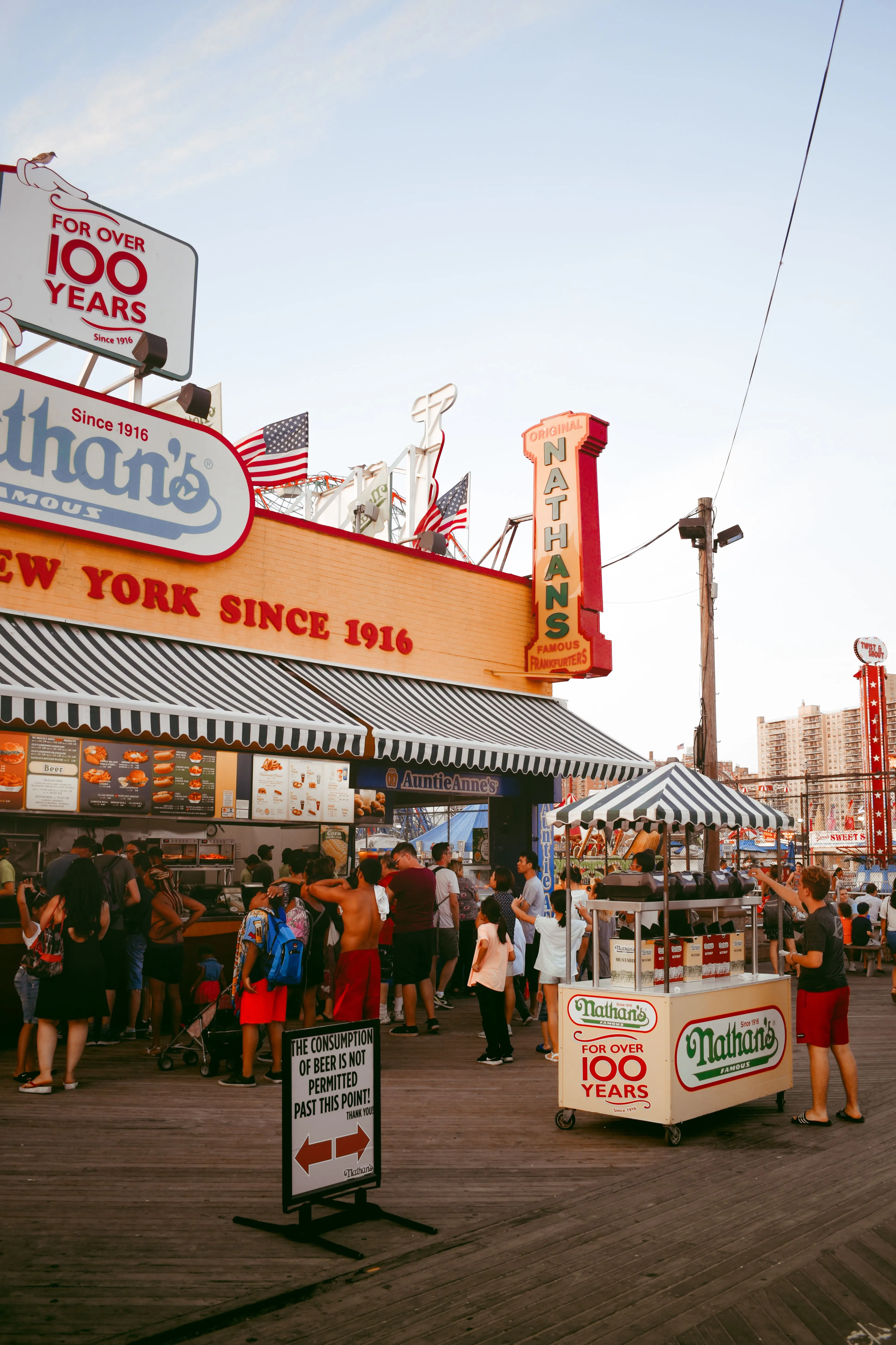Image of Nathan's Hot Dogs on a summer day