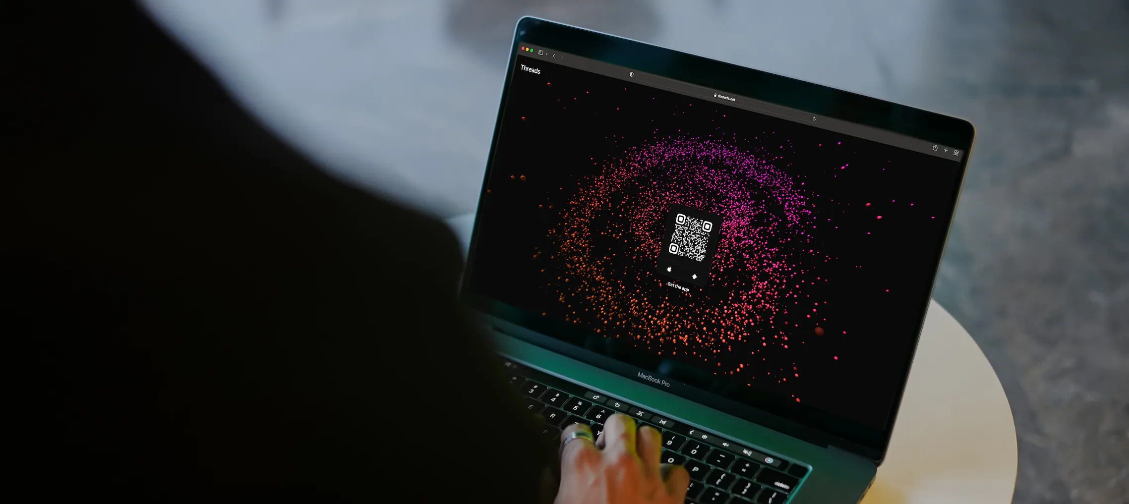 Customer using Threads on a laptop.