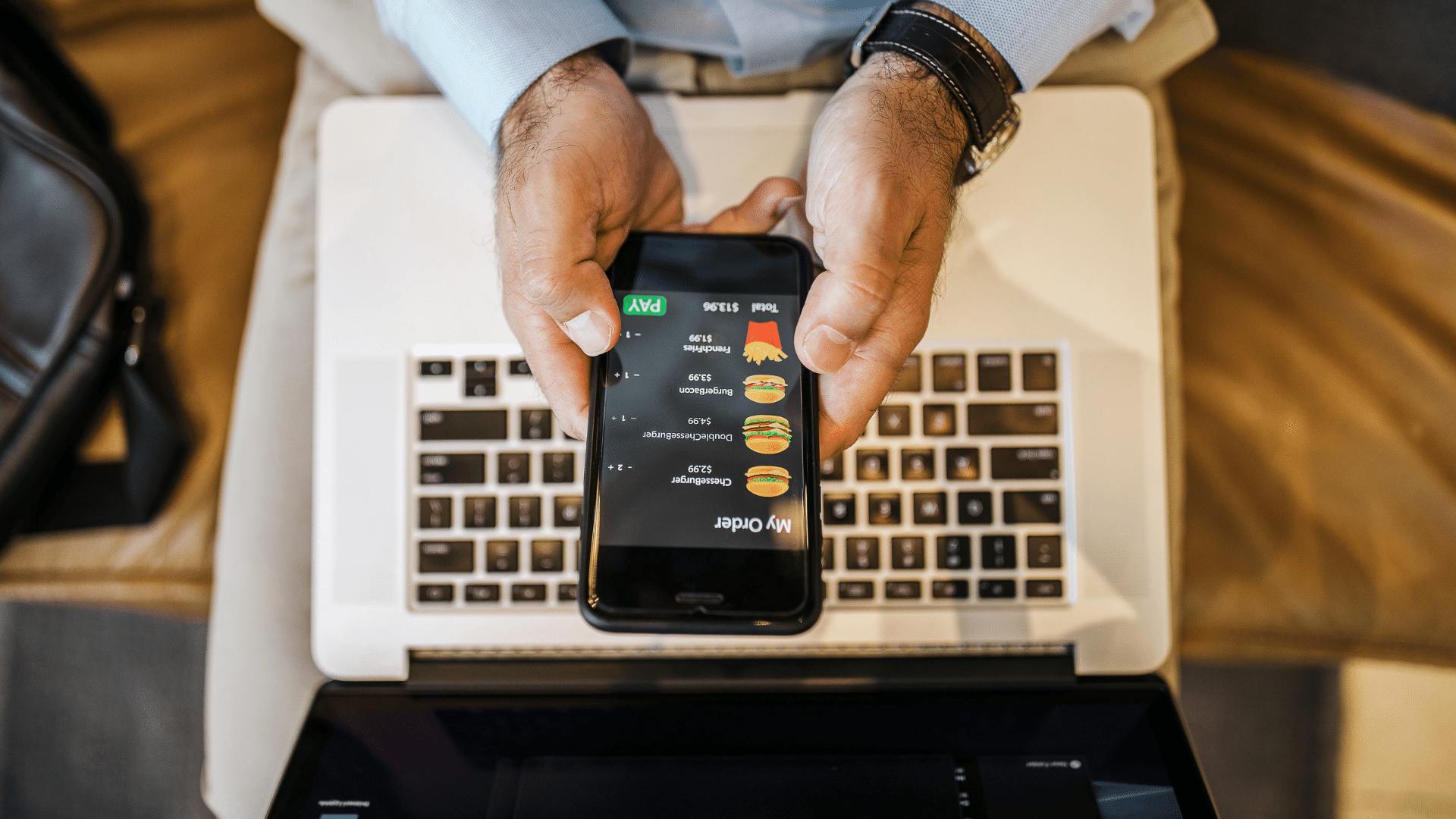 Image of someone ordering food for delivery on their phone