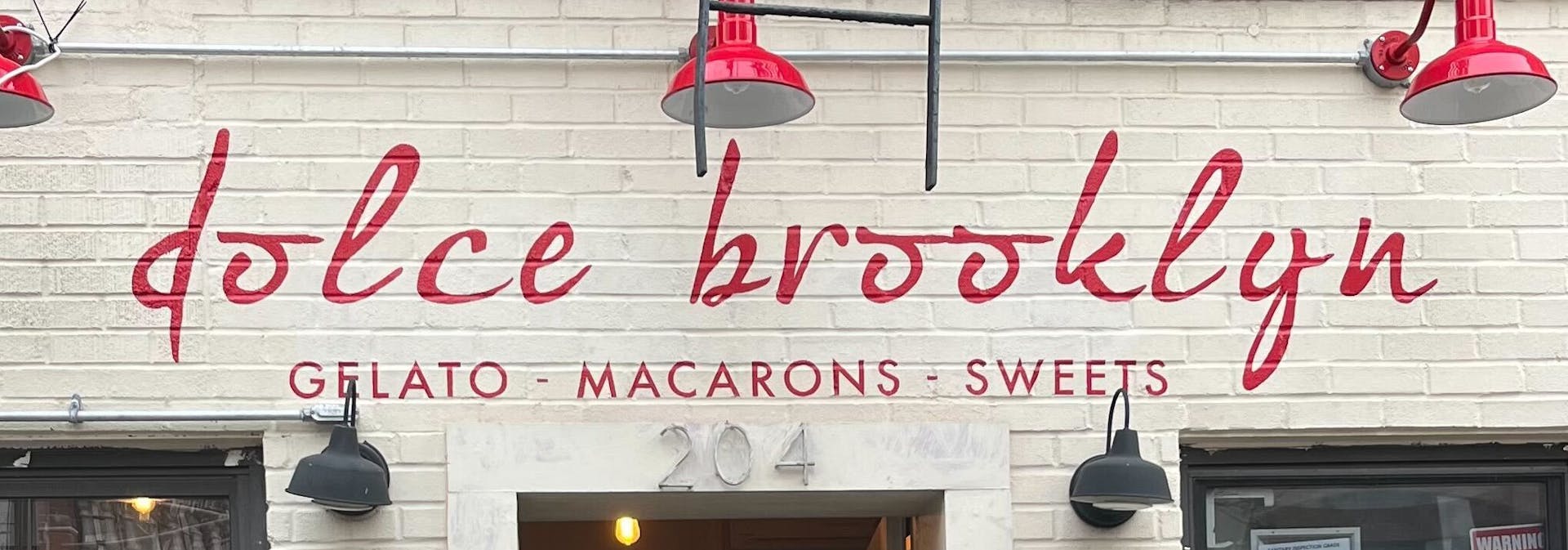 Logo of Dolce Brooklyn, an ice cream shop in NYC.