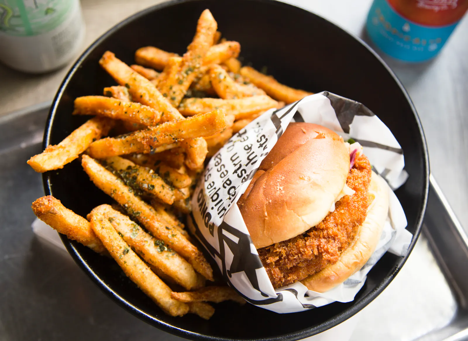PONKO'S fried chicken sandwich with fries.