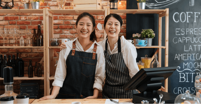 Image of two women working in a coffee shop