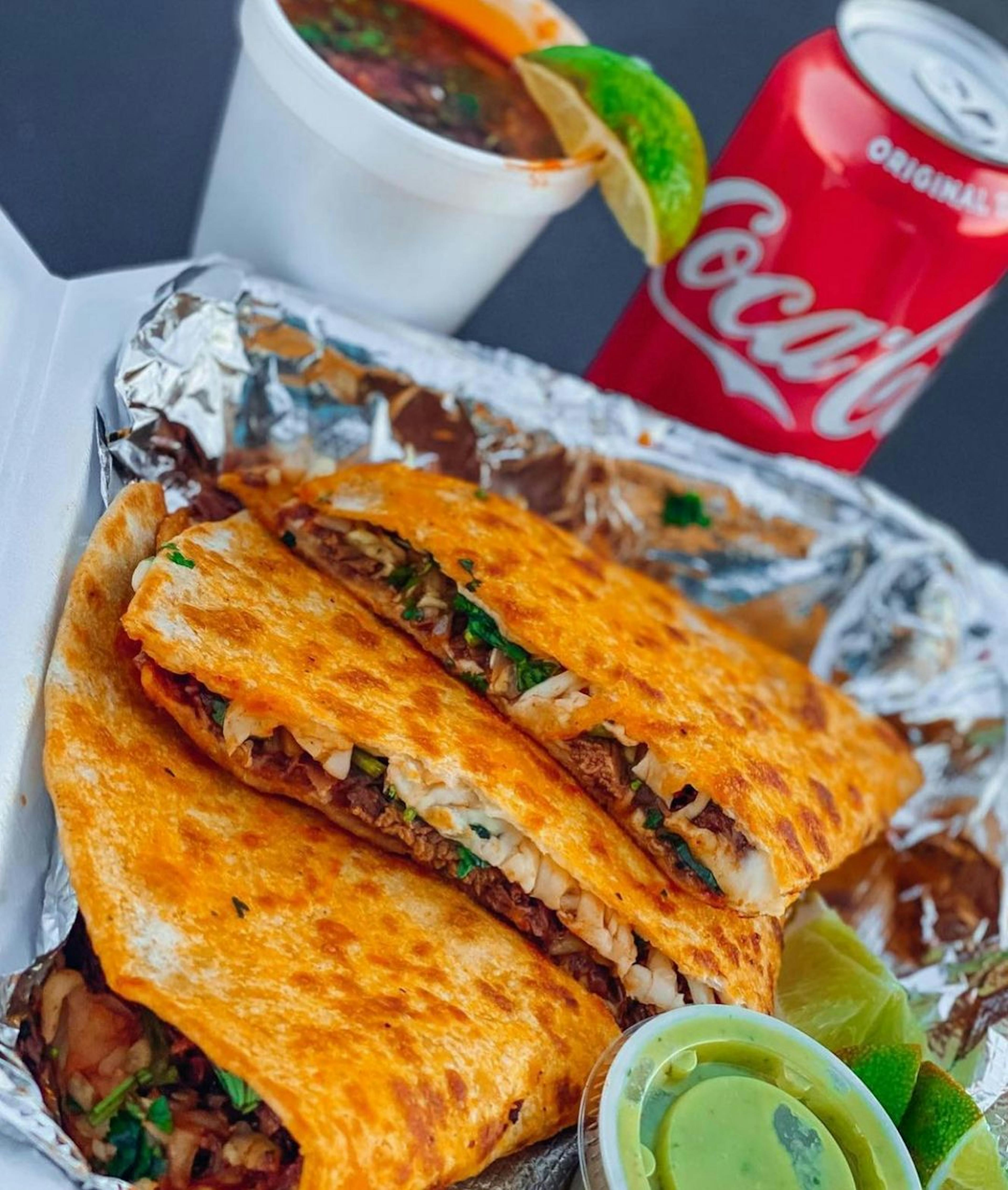 Image of a crispy quesadilla and a cocktail