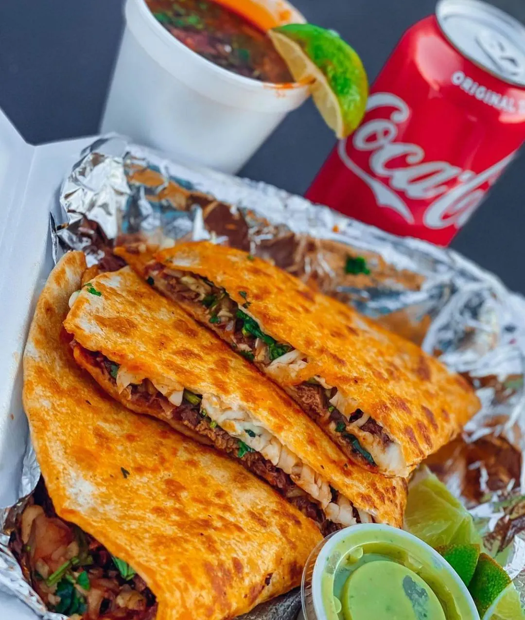 Image of a crispy quesadilla and a cocktail